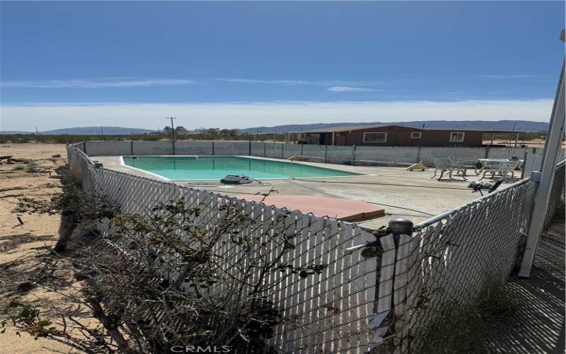 Fenced inground fiberglass pool and spa