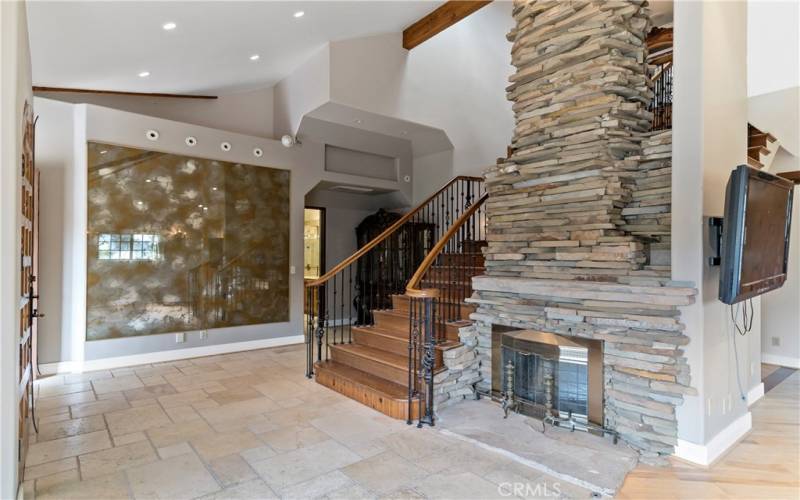 Entryway with beautiful stone fireplace