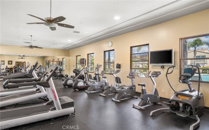 Who needs to join a gym when this workout room is located in your own clubhouse?