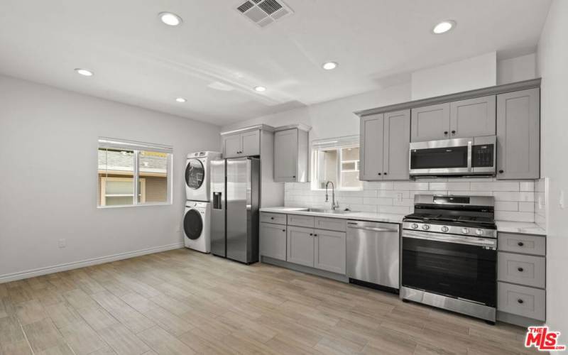 Brand New Kitchen With Stainless Steel Appliances