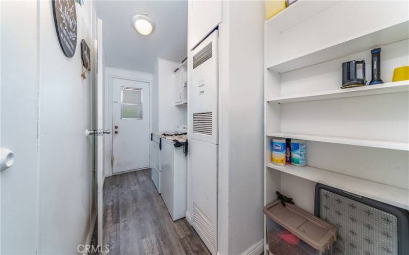 Conveniently located inside, washer and dryer adjacent to the pantry.
