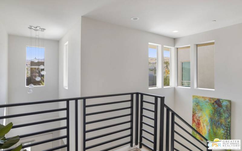 Stairwell is flooded with natural light and mountain views!
