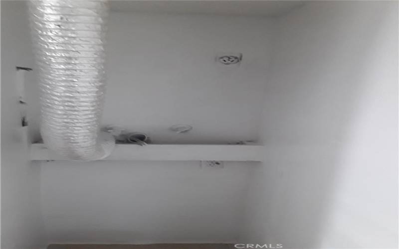   Washer/dryer hook-ups in hallway