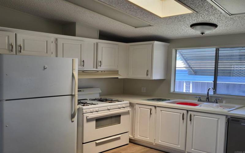 kitchen with skylight and dishwasher