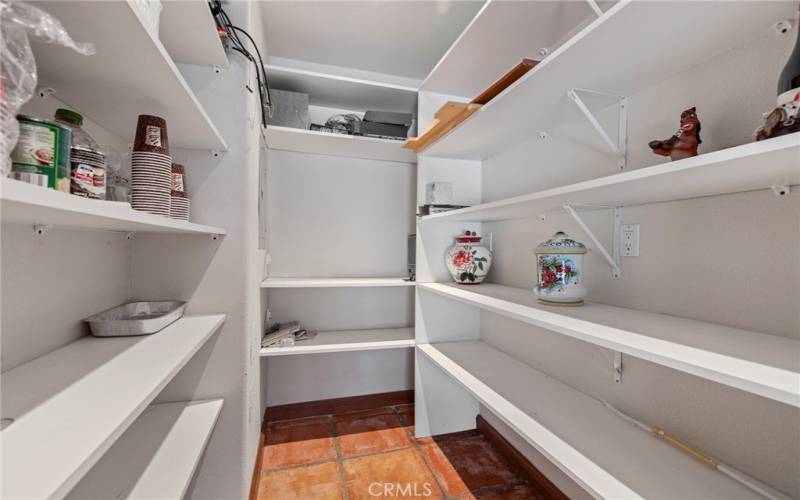 Walk-in pantry storage off the kitchen