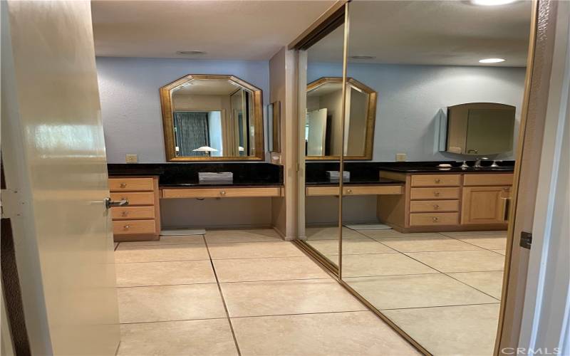 Master bathroom closet and vanity.