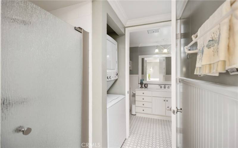 Jack and Jill bathroom features toilet & sink Powder rooms at each end and walk-in shower in the middle (with stackable w/d)