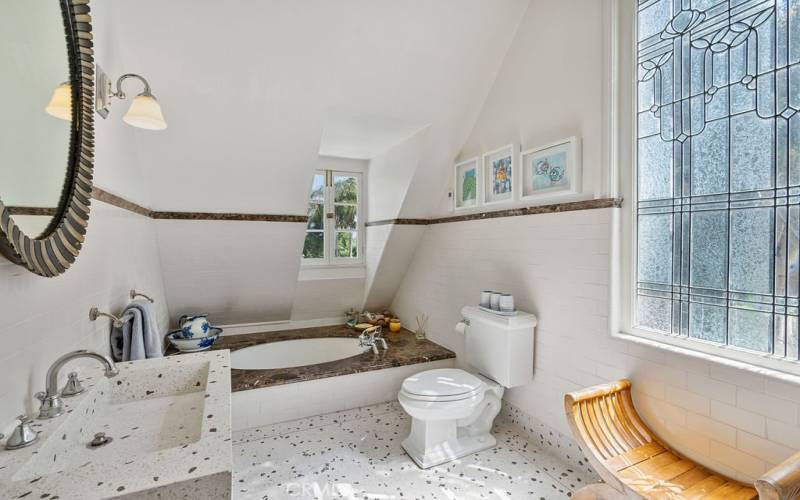 Upstairs bath with sunken tub, beautiful window