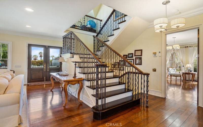 Stairway leading to upstairs foyer and bedrooms