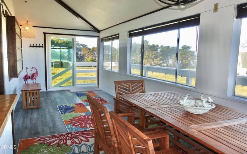 Sunroom with balcony slider