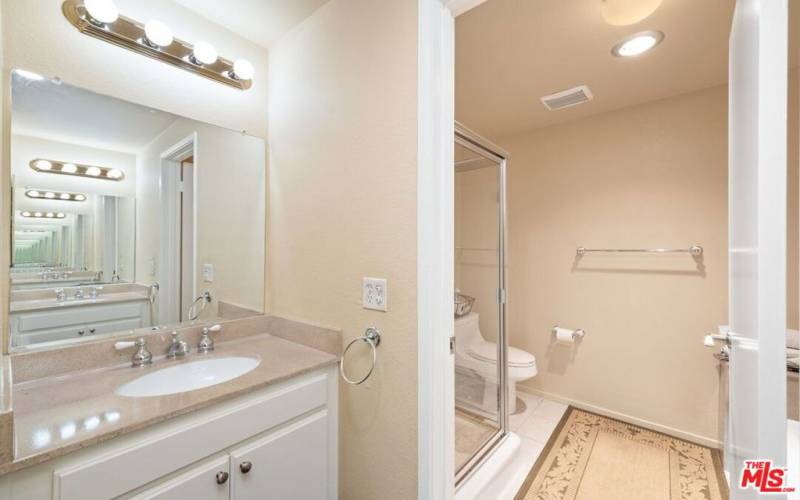 Primary Bathroom with dual vanities,