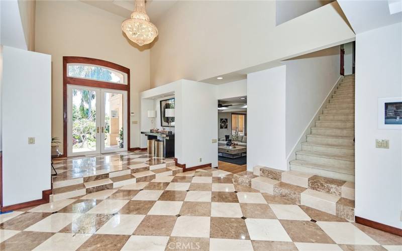 Entry with Marble flooring, Recessed Lights  & Decorative Lights