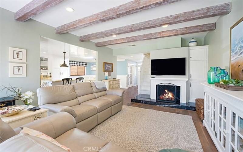 Large living room with fireplace.