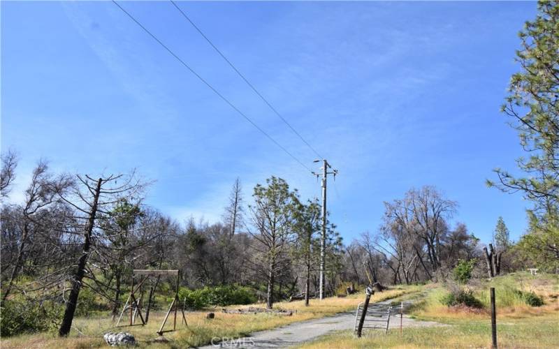 Power pole and power lines run through the property.