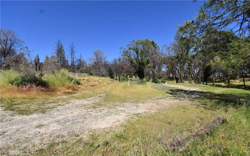 Middle pad below where house stood.  Well is on the far end.