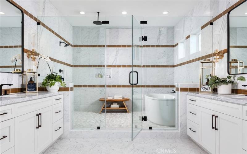 Primary Bathroom with tub and shower