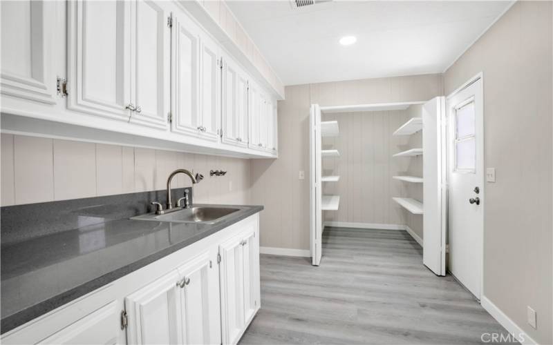 Laundry room and walk-in storage