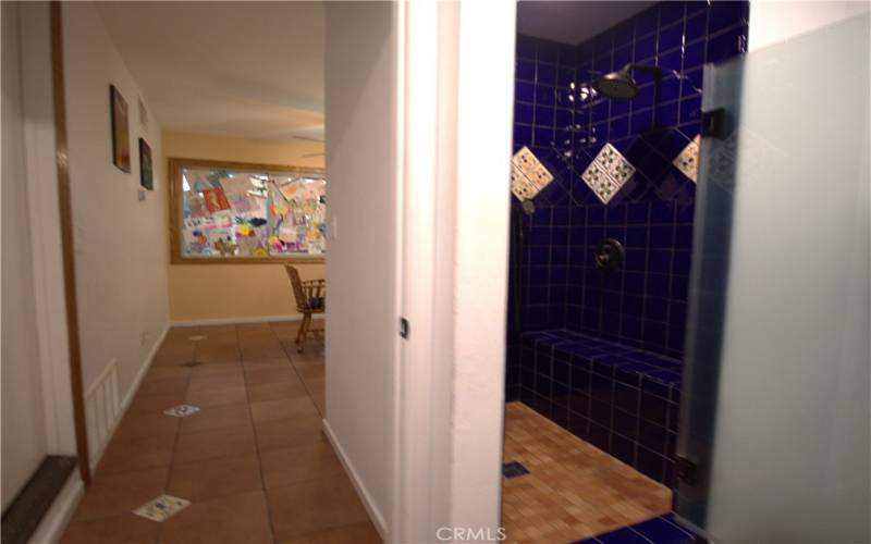 Bathroom leading to dining room