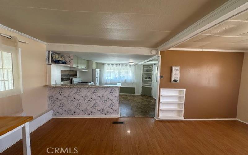 Living room facing the kitchen.