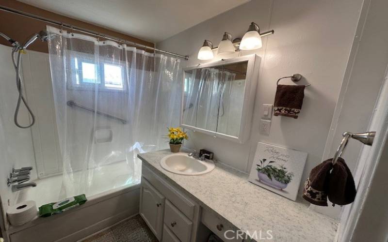 Bathroom with a tub/shower.