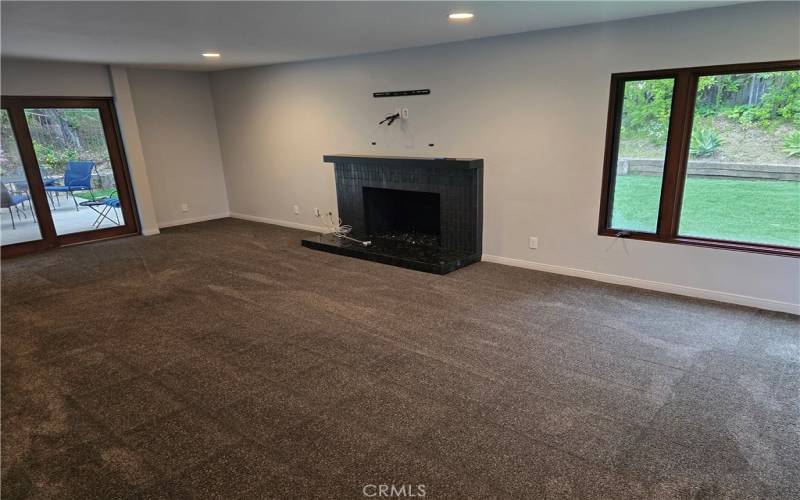 Living Room fireplace, with TV mount above