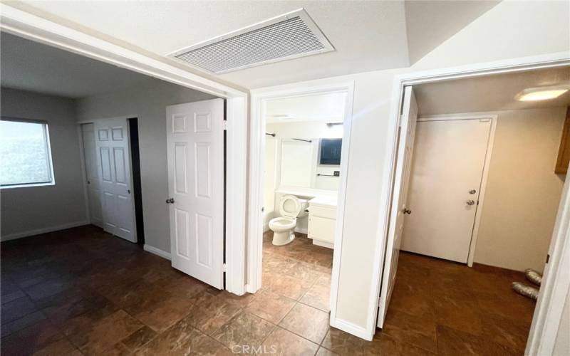 Downstairs Bathroom, Laundry and Bedroom from Hall