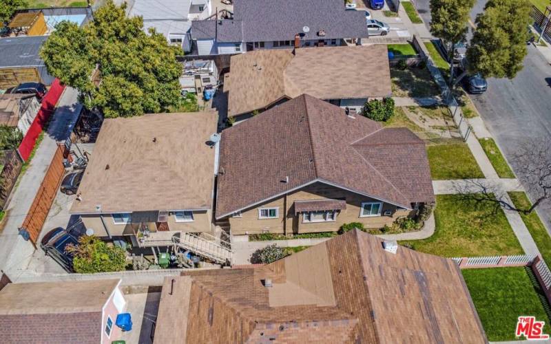 Aerial of front home and rear apartment