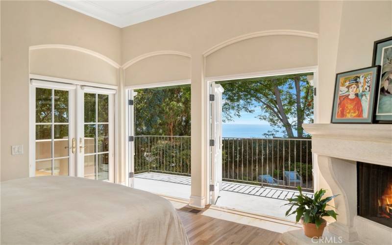 Enjoy ocean and canyon views from this private balcony and enjoy the lovely fireplace in the primary suite.