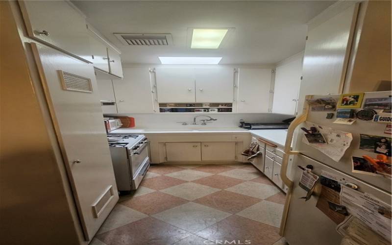 Full Galley Kitchen with skylight