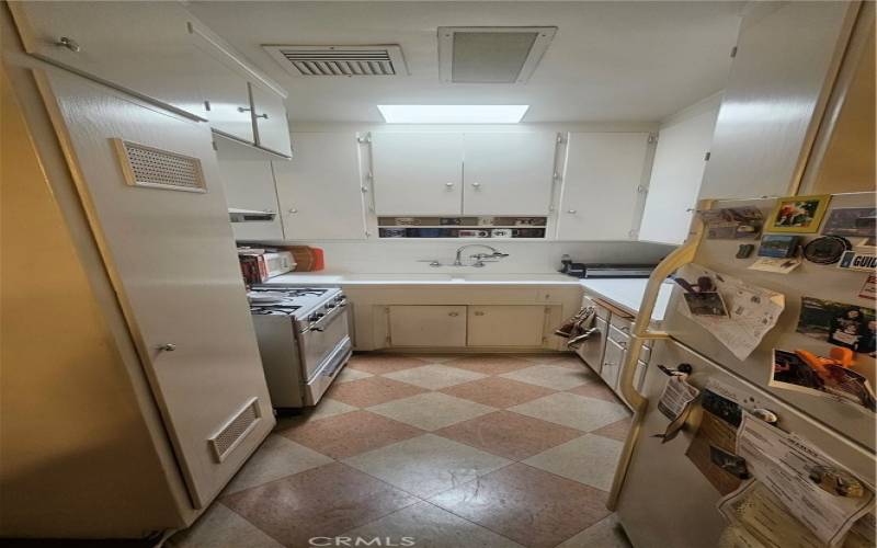 Full Galley Kitchen with skylight
