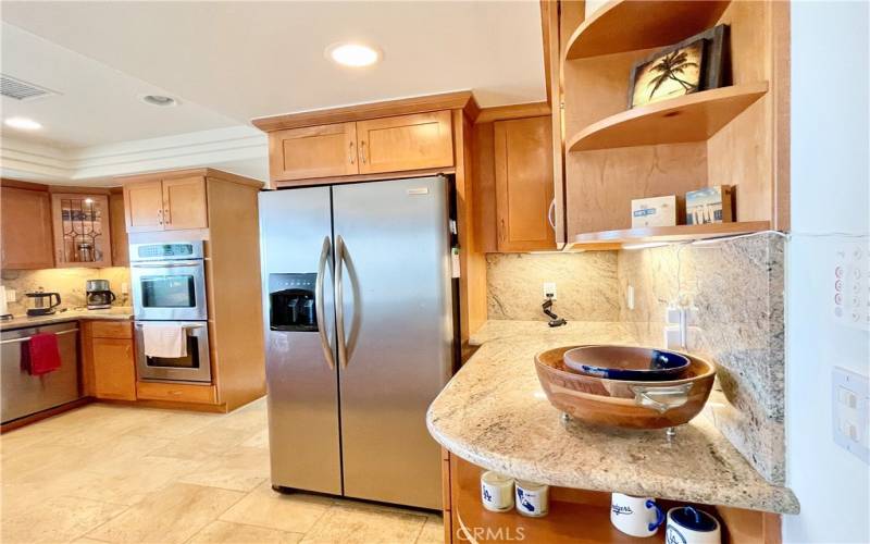 Double ovens, microwave, dishwasher, stone countertops
