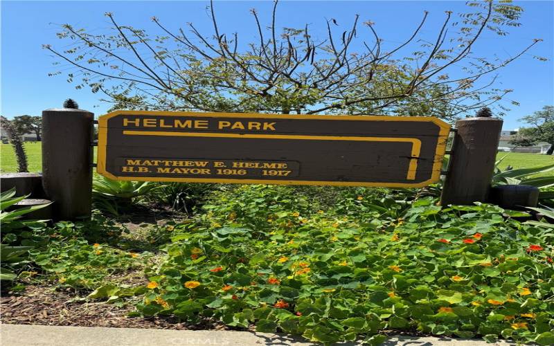 Helme Park is across the street.  Picnic table and playard. Large grass areas  Appears to be an area where lots of dogs love to play .