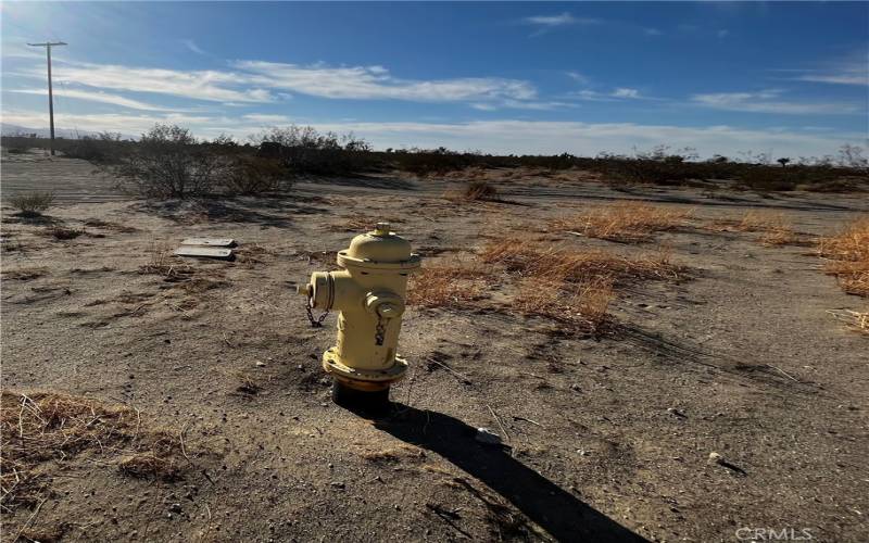 water/fire hydrant located across the street from lot