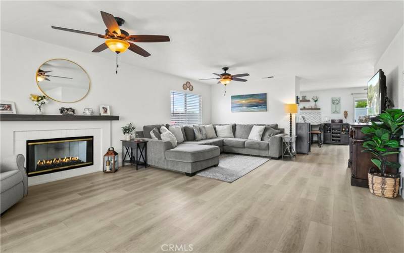 Two ceiling fans keep the large living area cool all summer long.