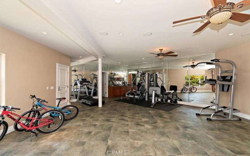 Private gym or convert to in-laws quarters with a separate entrance.