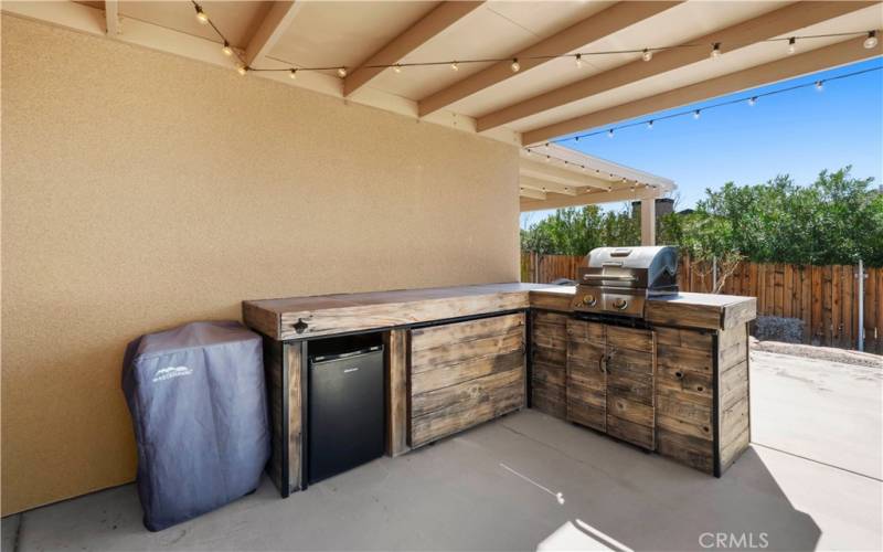 Built in BBQ area that is covered.
