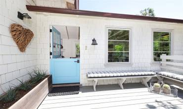 Charming patio at entry with Dutch door