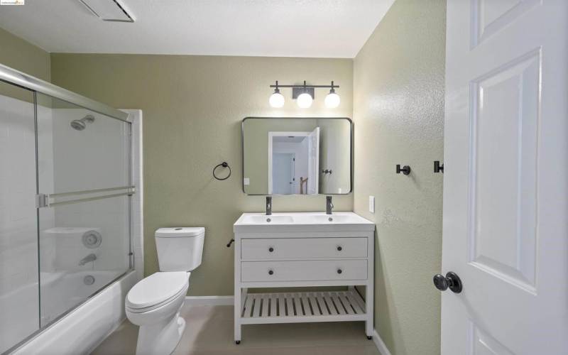 Downstairs, hallway, full bathroom with tub/shower combo