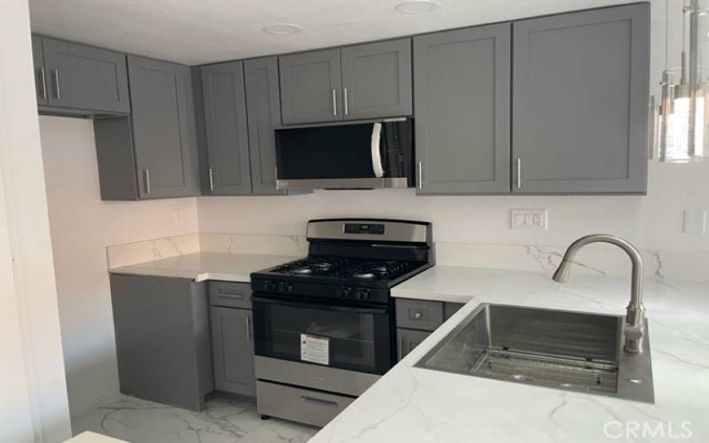 Newly remodeled quartz counters and Brand new cabinets