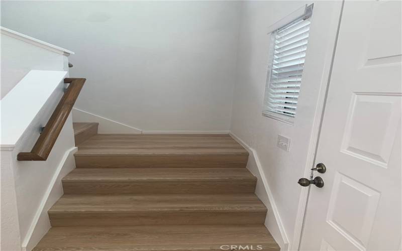 Stairs to bedroom and full bath