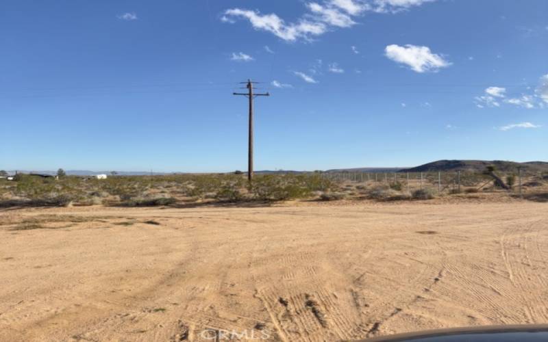 Power pole on the road