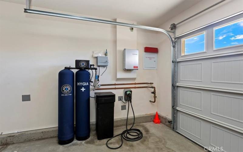 Garage  - EV hookup, sprinkler system, water softener hookup (tanks not included)