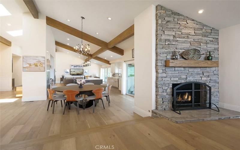 Family Room with Fireplace Opens to Dining & Kitchen