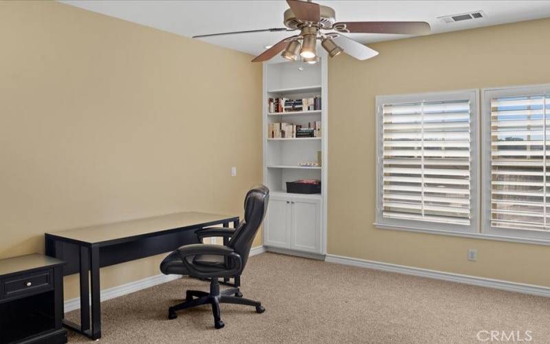 Bedroom or office with built-in bookcase