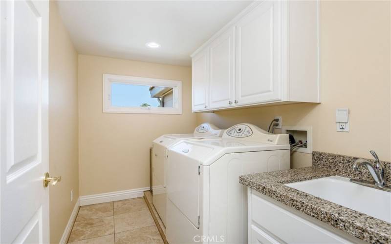 The upstairs laundry room, how convenient! There is another one downstairs.
