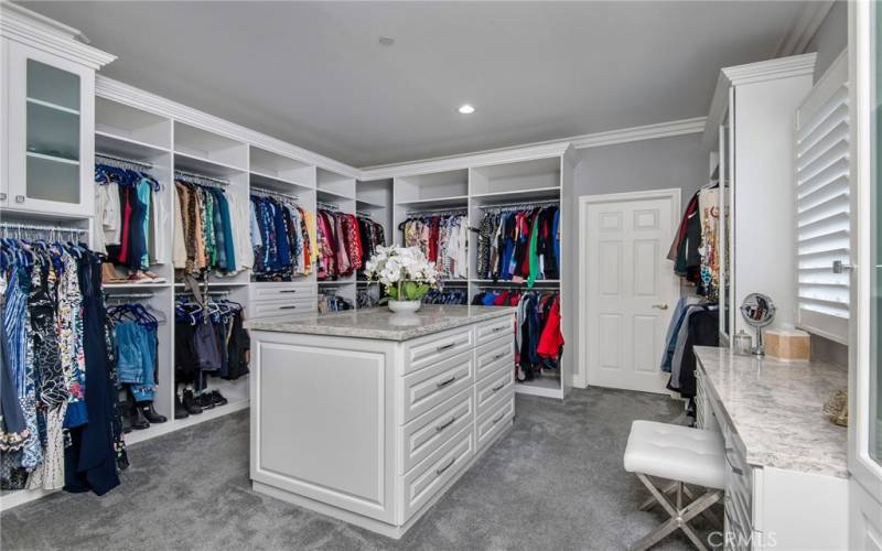 There are two walk-in closets in the primary suite. The eighth bedroom has recently been converted into a luxurious closet, dressing room area with a vanity area.