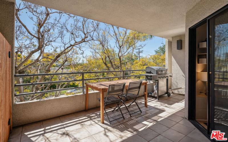 Large Covered Balcony with Gas BBQ & Southwest Facing Tree Top Views
