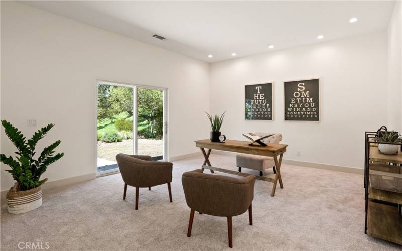 There is a wonderful room connected to the primary bedroom that could serve as an office, exercise room or sitting room. The options are endless.