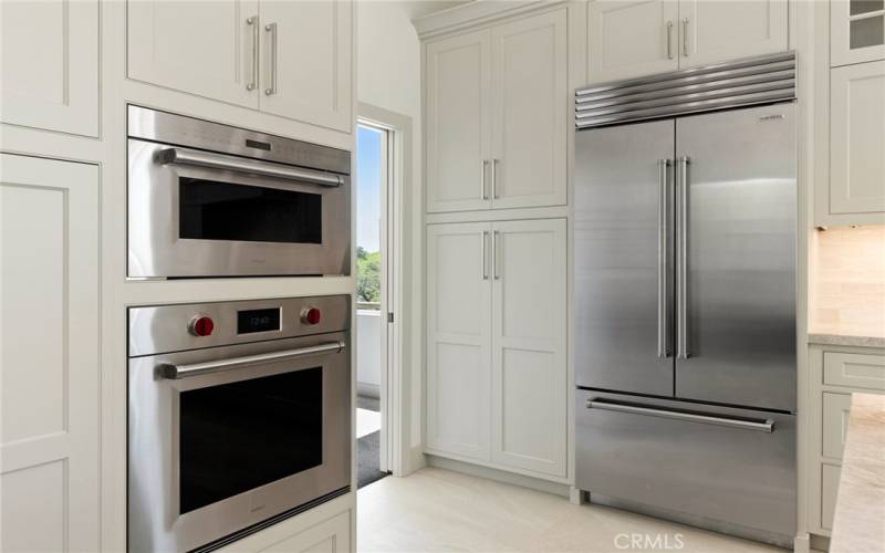 Superior stainless steel Wolf and Subzero appliances make cooking and baking a dream.