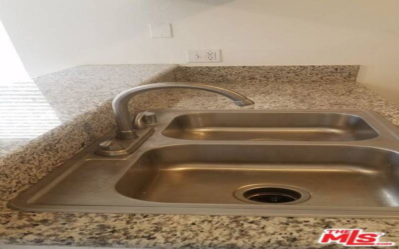 Granite counters, double sink